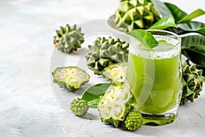 Noni Fruit Juice Isolated, Morinda Citrifolia with Noni Slice and Noni Powder on White Background