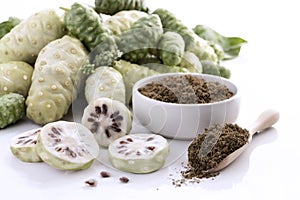 Noni fruit or Morinda Citrifolia with noni slice and noni powder