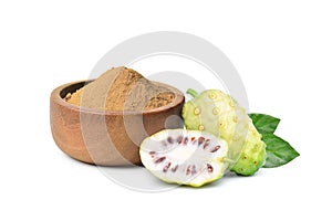 Noni or Morinda Citrifolia powder in wooden bowl