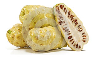 Noni or Morinda fruits isolated on white background