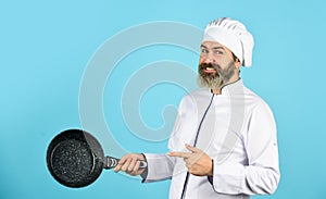 Nonstick cookware. Frying without oil. Professional kitchenware. Nonstick pan for frying. Enameled cooking vessels. Man