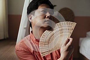 Nontraditional guy and his traditional fan