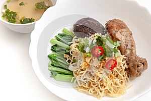 Noodle with chicken drumstick served with soup