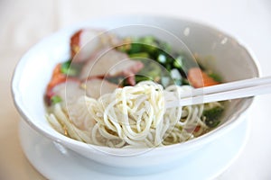 Noodle and dumpings with red pork