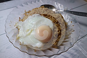 Noodle fried with eggs on topping