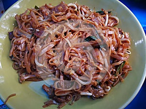 Noodle fried with Thailand herbs for many kinds of vegetables. Famous Cuisine of Eastern Thailand