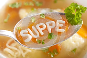 Noodle soup with dumplings photo