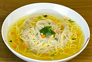 Noodle soup in white bowl