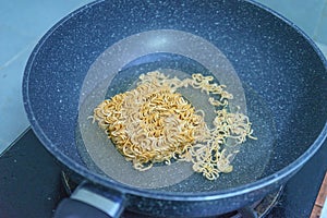 Noodles in boiling water
