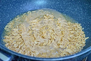 Noodles in boiling water