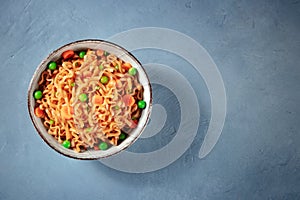 Noodles bowl on a blue background