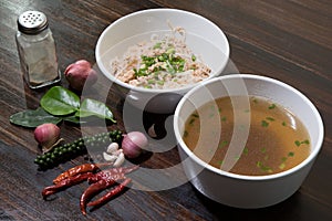 Noodles  in bowl on wooden background, selective focus. Asian meal on a table