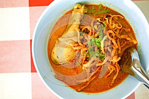 Noodles with chicken curry soup