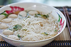 Noodles, pork balls.