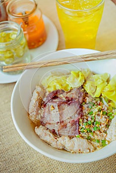 Noodles pork dumplings,spicy soup thai style