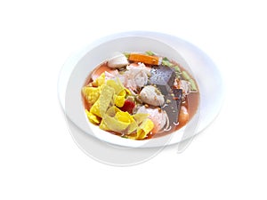 Noodles with seafood soup and red on a white background,with clipping path