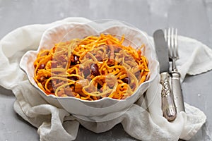 Noodles Tai style mixed with spicy tomatoes and meat