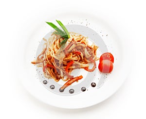 Noodles with tomato sauce and vegetables on white background