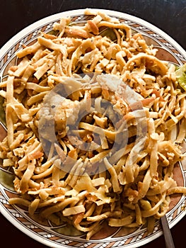 Noodles with vegetables and chicken chrimp photo