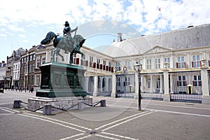 Noordeinde Palace and equestrian statue of Wilhelm I in the center of The Hague, the official residence of the Dutch monarchs,