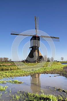 Noordeveldse windmill with a clear blue sky