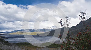 Nordenskjold lake view, with snowy mountais in the back. photo