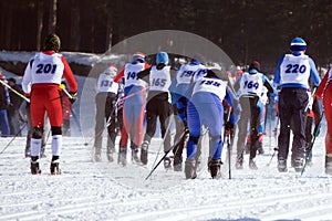 Nordic combined skiers get ready to start running the race at the World Cup Ski jumping at the Winter Olympics was held at the