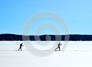 Nordic skiing on frozen lake