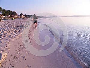 Nordic walker at the beach