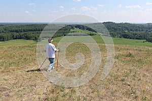 Nordic Walking - elderly woman is hiking in summer