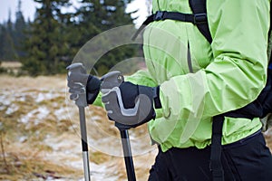 Nordic walking in mountains, hands and poles