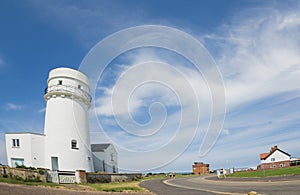 Norfolk coastline, lighthouse and blue skies