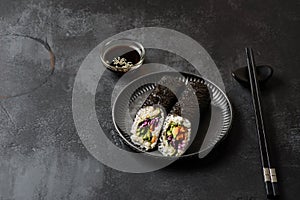 nori roll on black background