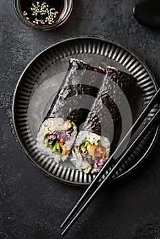 nori roll on black background