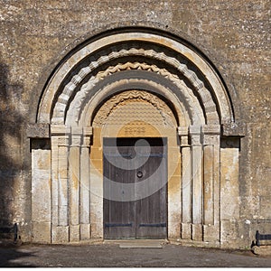 Norman doorway at Guiting Power church, Cotswolds, Gloucestershire, England