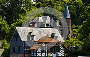 A Norman house with thatched roof in Etretat, Normandy, France