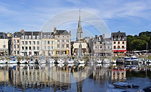 Normandy, traditional houses and boats in the old harbor basin