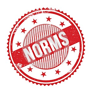 NORMS text written on red grungy round stamp