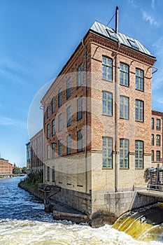 Norrkoping Motala Strom Waterfall and Building photo