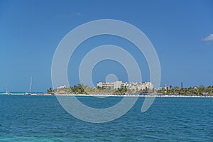 Norten beach on colorful Isla Mujeres island near Cancun in Mexico, view from the ferry photo