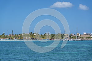 Norten beach on colorful Isla Mujeres island near Cancun in Mexico, view from the ferry photo