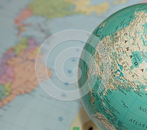 North American map of the globe with a map of the earth in the background