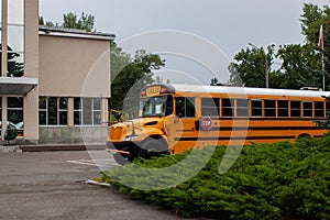 North American Yellow School Bus Parked On The Street