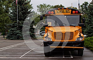 North American Yellow School Bus Parked On The Street