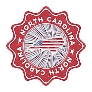 North Carolina round grunge stamp with us state.