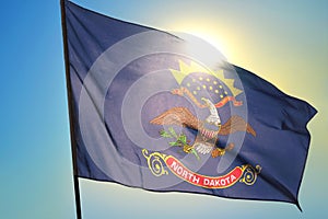 North Dakota state of United States flag waving on the wind