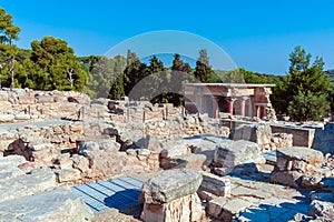 North Entrance with charging bull fresco and red columns, Knossos palace