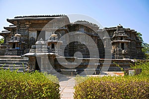 North entrance on the left, Facade and ornate wall panel relief of the North side, Hoysaleshwara Temple complex, Halebid, Karnatak