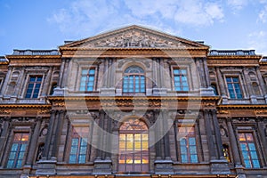 North facade of the Napoleon Square Court (Cour Carré in French) un an early sunset blu summer sky