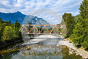 North Fork Skykomish River bridge at Index Washington under partly cloudy sky